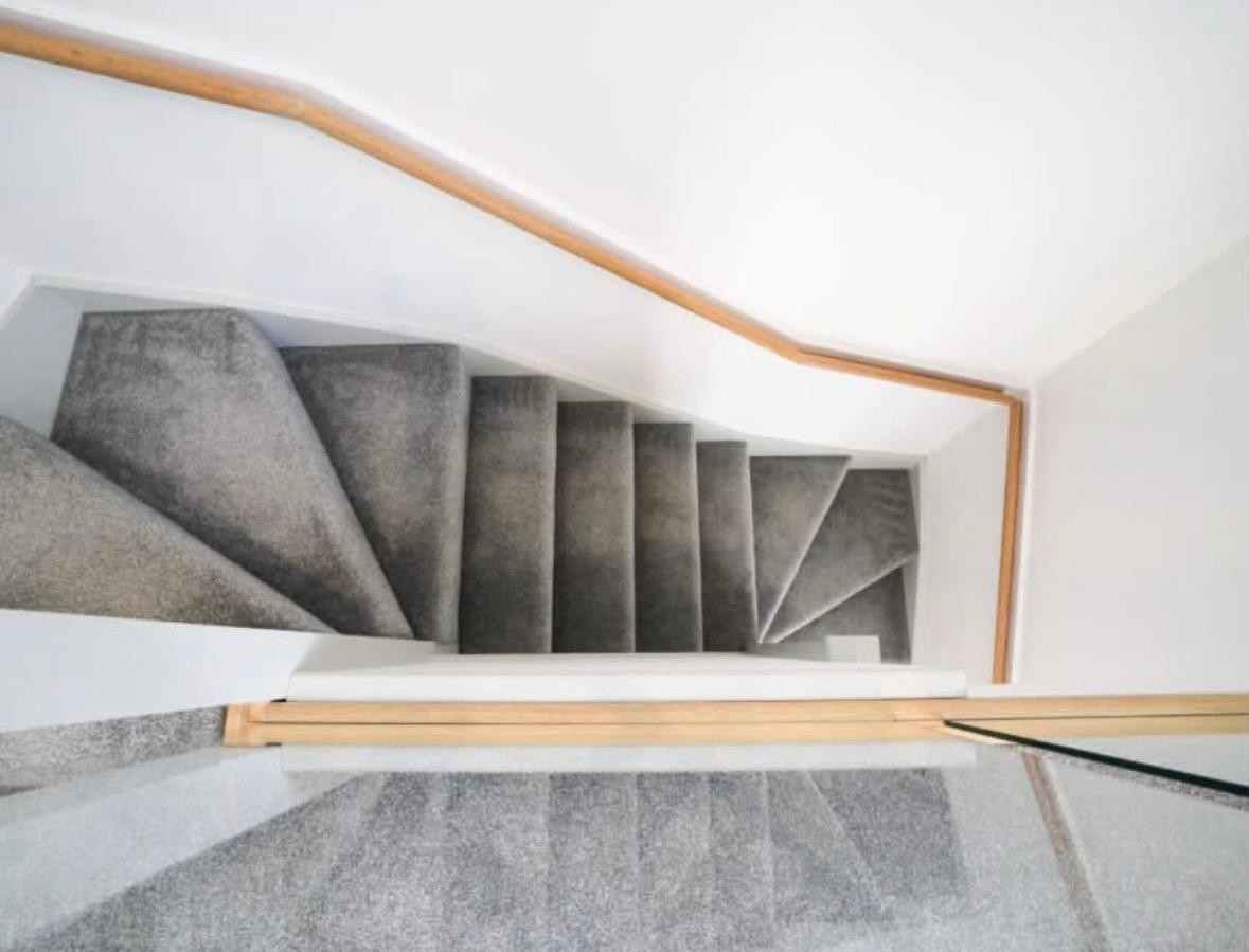 Staircase and timber handrail