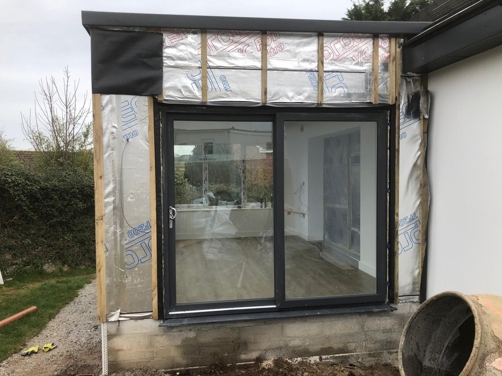 Sliding doors before cladding